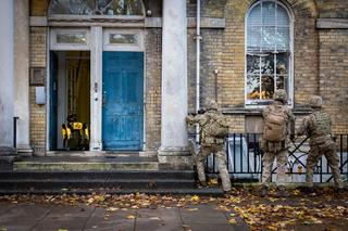 UK soldiers conduct drills using a Cerberus QUGV, a complete CBRNE detection robot package known as “Spot”. 