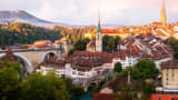 Bern Skyline taken from the Rosengarten at sunrise in Switzerland. 
Church centre: Nydeggkirche
Cathedral right: Berner Münster
Bridge left: Nydeggbrücke