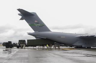 A Mid-Range Capability Launcher is loaded into a US Air Force C-17 Globemaster III, April 2024. 